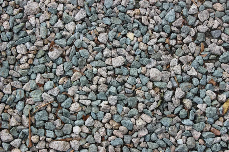 Close-up of small grey and blue-green stones